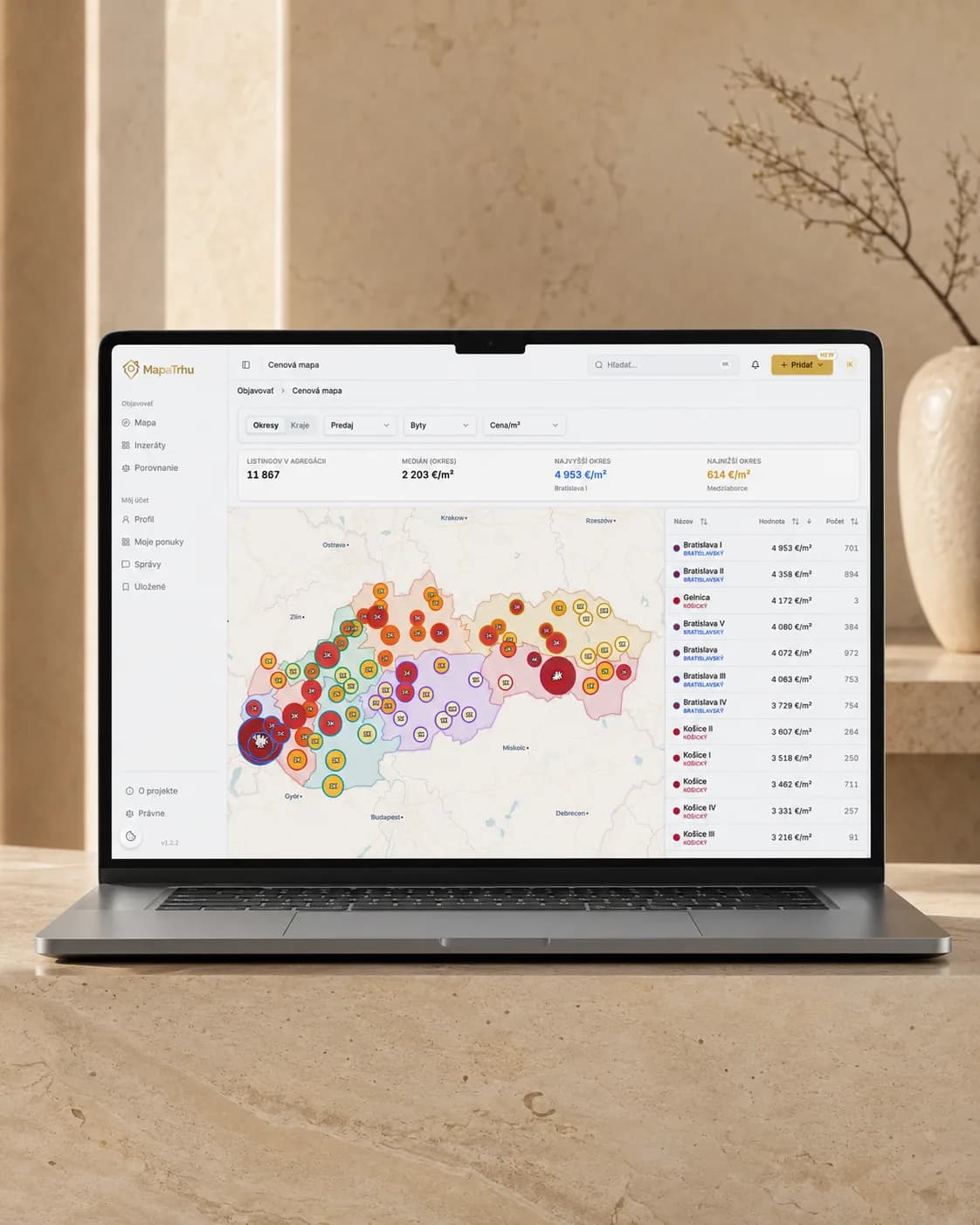 Slovak price map displayed on a laptop in a natural interior