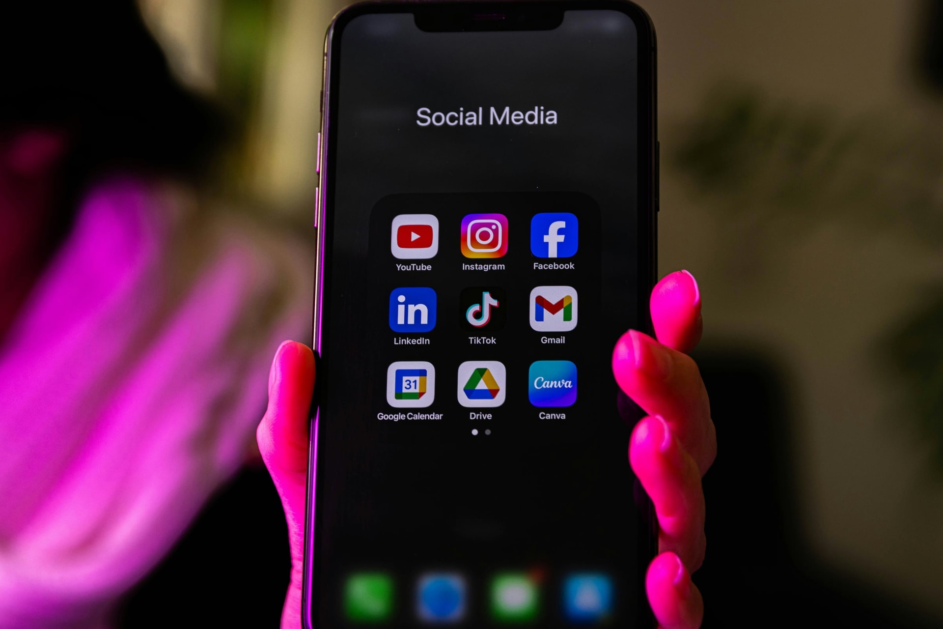 Smartphone displaying social media app icons