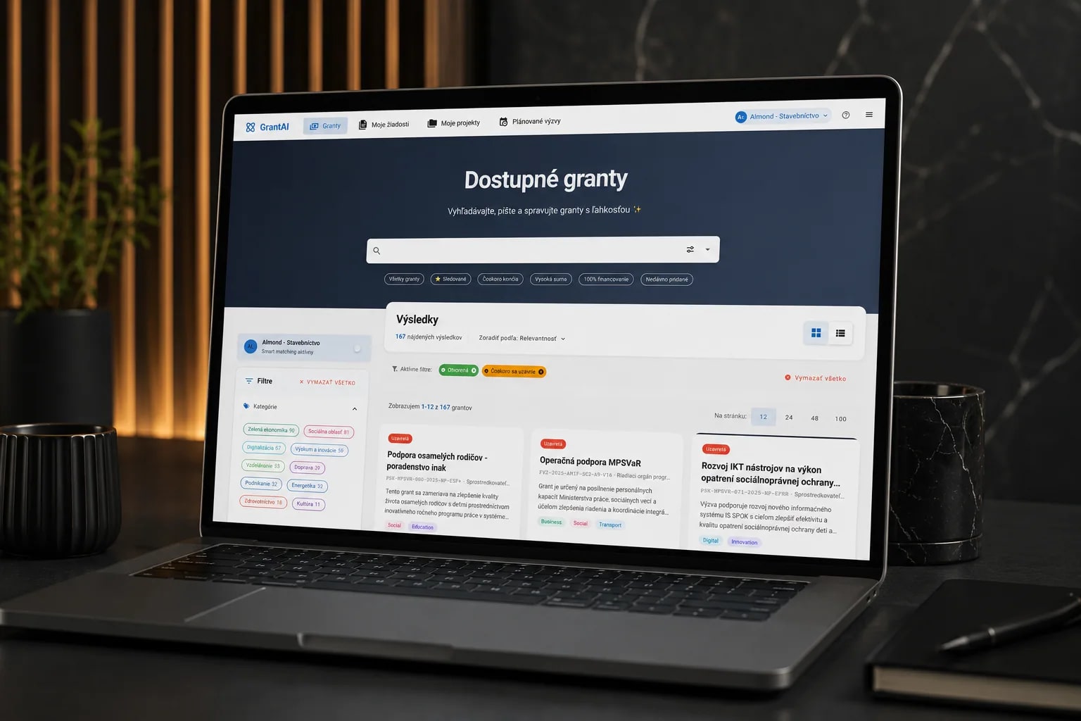 GrantAI grant-call dashboard on a laptop